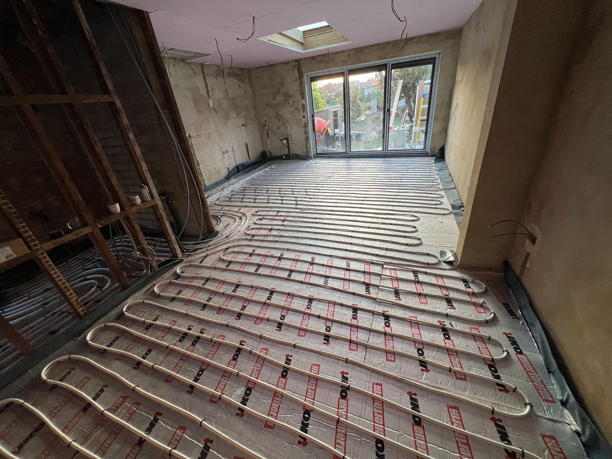 Underfloor heating installation on site